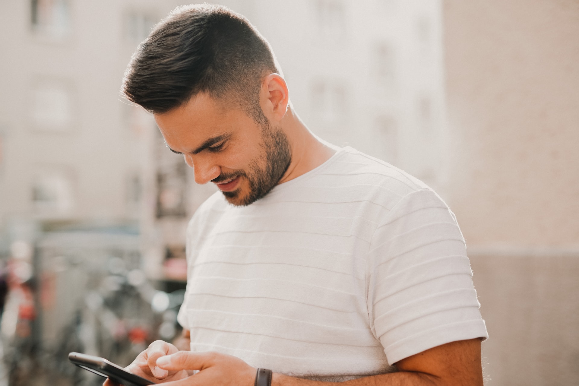 A man using his cellphone in public